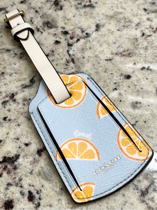 Coach Handbags - Coach Orange Slice Leather Luggage Tag EUC